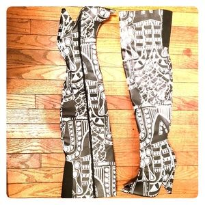 Black and white thigh high boots